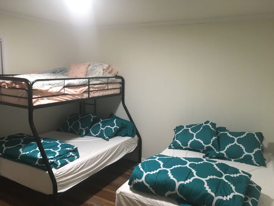 Full bunk bed and twin up top and full size bed 