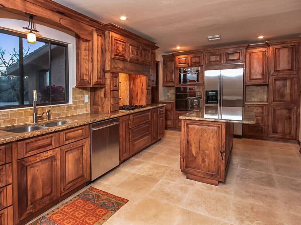 Kitchen overlooking Grill & Pool Area