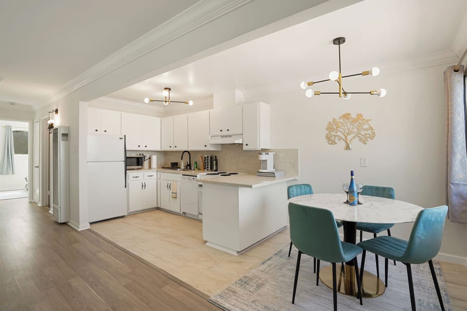 Family Apartment, 2 Bedrooms, Balcony, Ocean View | Private kitchen | Coffee/tea maker, dining tables