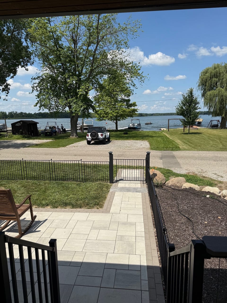 View of the front lawn and lake from the front porch.