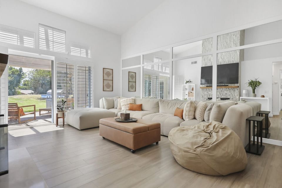 Living room leads directly to back patio