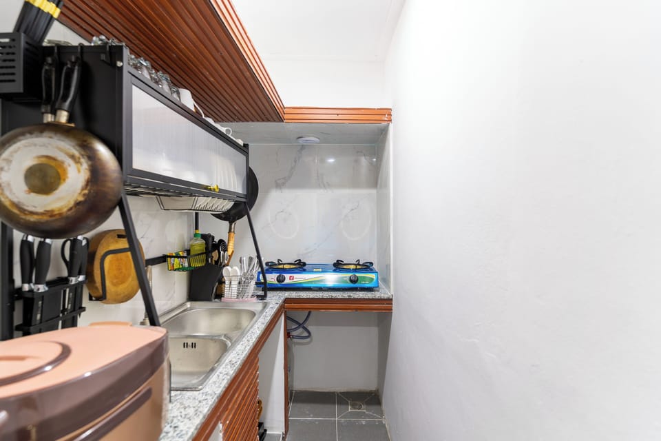 Deluxe Villa, Balcony, Garden View | Private kitchen | Electric kettle