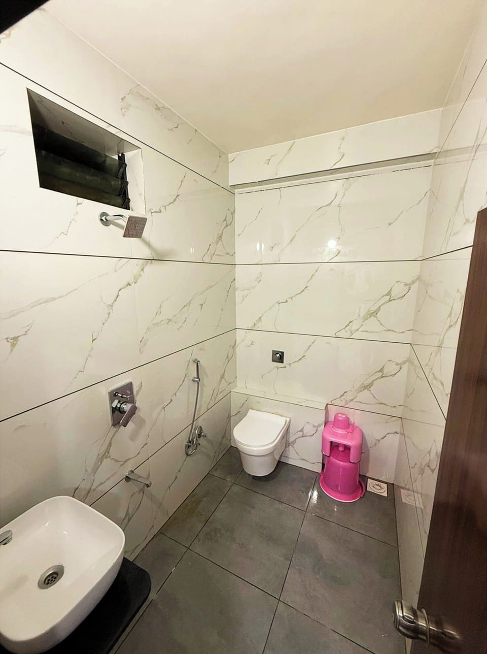Shower, free toiletries, slippers, soap