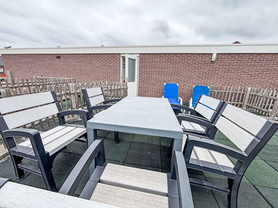 Wood, Furniture, Floor, Chair, Shade, Outdoor Furniture, Wood Stain, Awning, Balcony, Outdoor Table