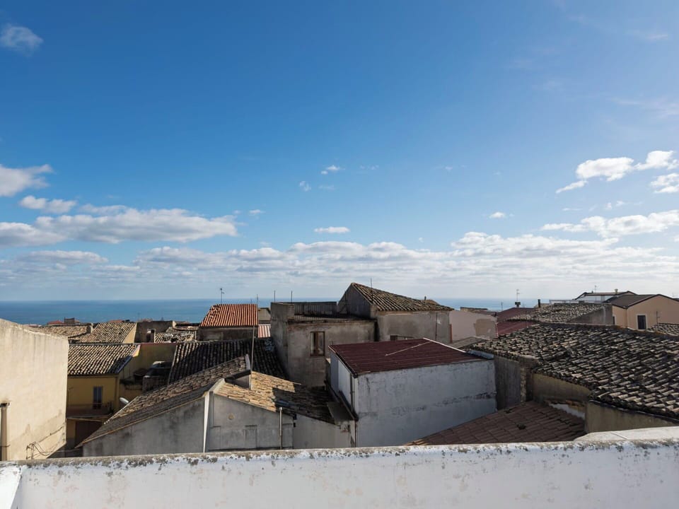 Sky, Blue, Daytime, Roof, Residential Area, Horizon, Cloud, Human Settlement, Suburb, Cumulus