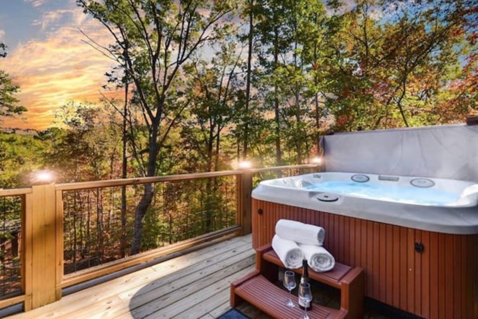 Unwind in a private jacuzzi w/ forest views, deck lights, towels & mountain air!