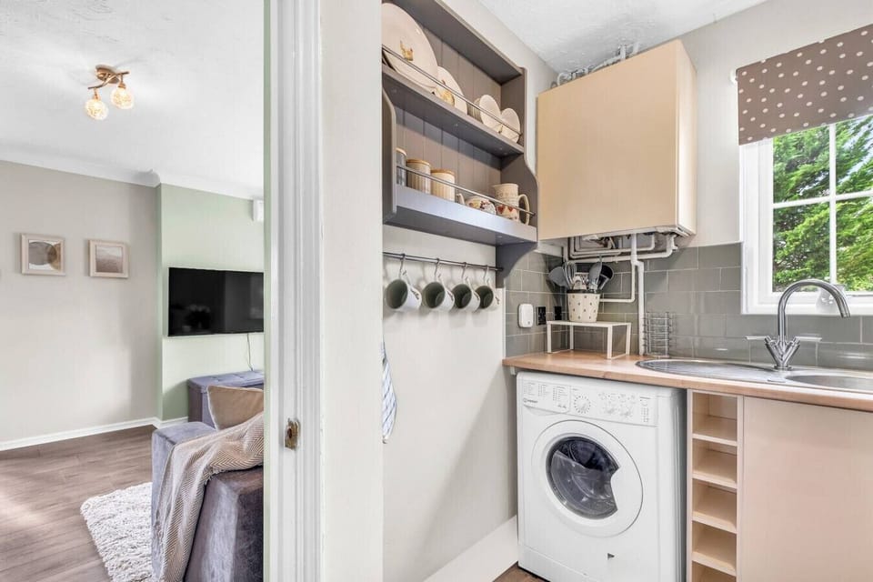 A fully equipped kitchen stocked with all the essentials you need to prepare and enjoy a home-cooked meal during your stay.