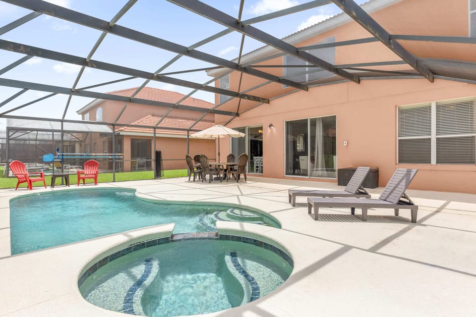 Furnished sundeck with swimming pool and hot tub