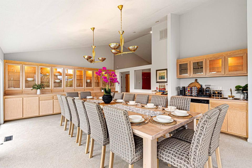 Dining Room: Gather around the spacious table, perfect for festive feasts and unforgettable moments!  Update: The carpet has been recently replaced with beautiful, dog-friendly LVP flooring — updated photos coming soon!