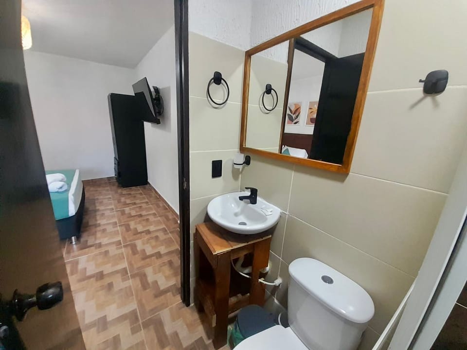 Shower, rainfall showerhead, hair dryer, towels