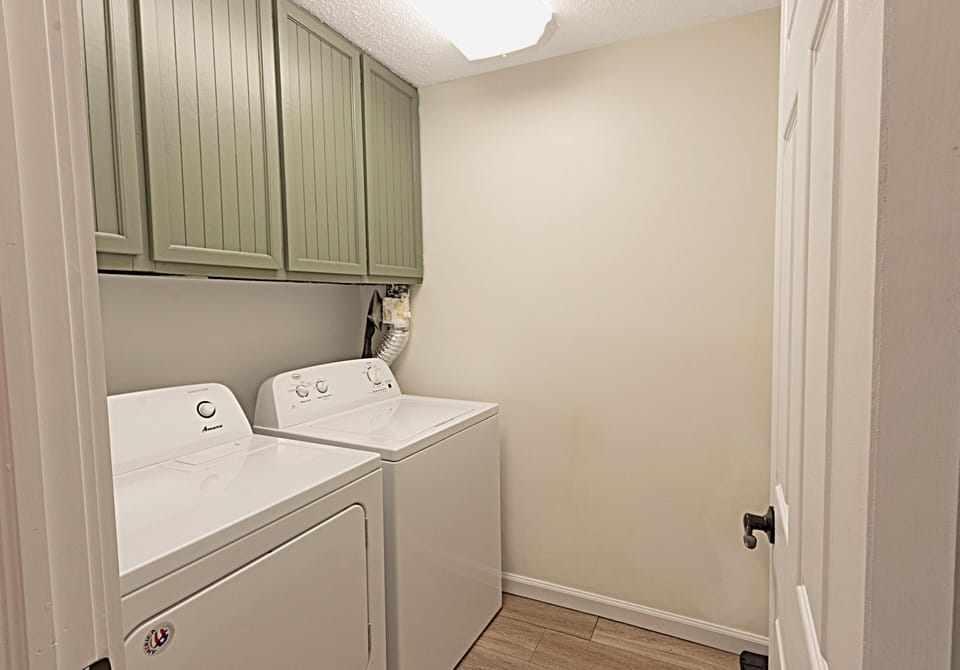 The first floor has full laundry amenities.
