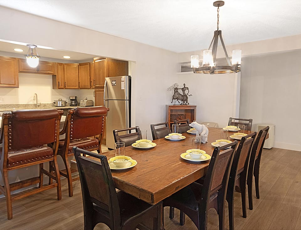 Spacious dining area with seating for eight and a spot for family meals or group gatherings.