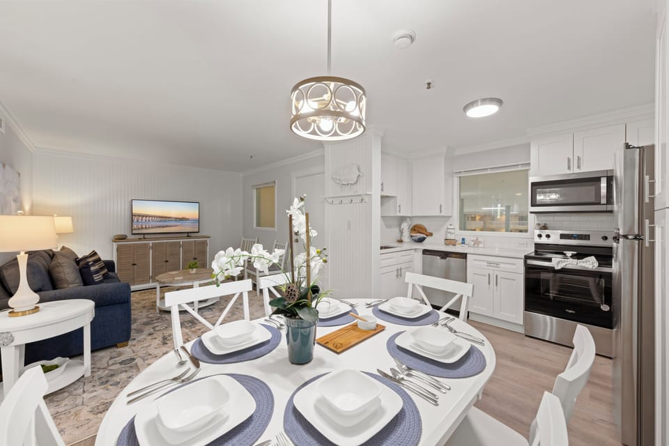 Gather around the table for a meal, a laugh, in our warm dining space.