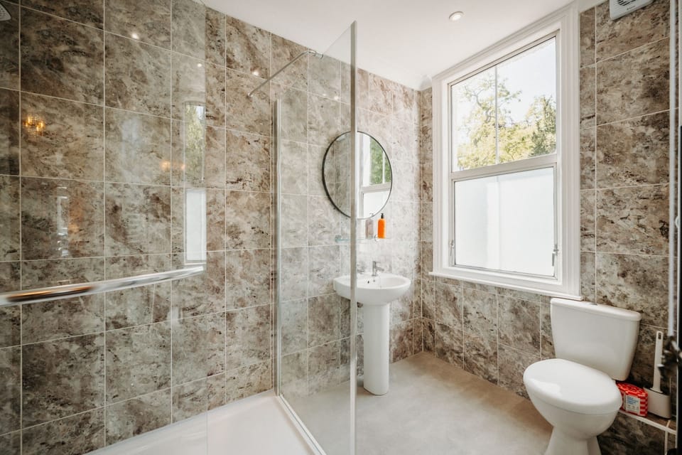 Superior Double Room, City View | Bathroom | Shower, hair dryer, towels, soap