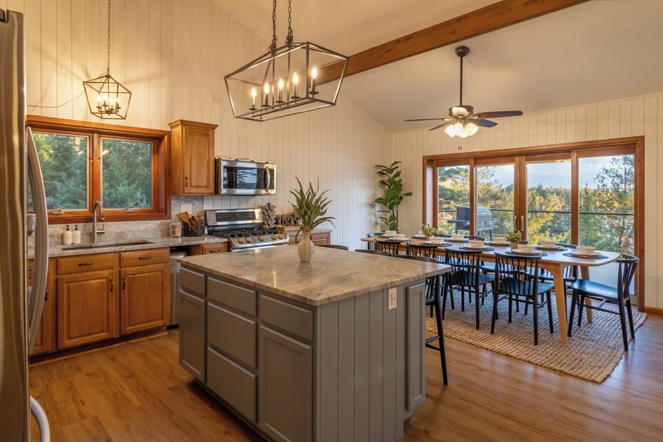Open kitchen with everything you need flows into the dining area.