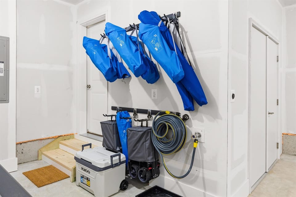 Beach chairs, umbrellas, carts, cooler, and NEMA 14-50 plug to charge EVs.