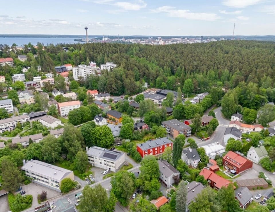Stunning aerial view showcasing the incredible proximity to the lake, nature trails, and local services.