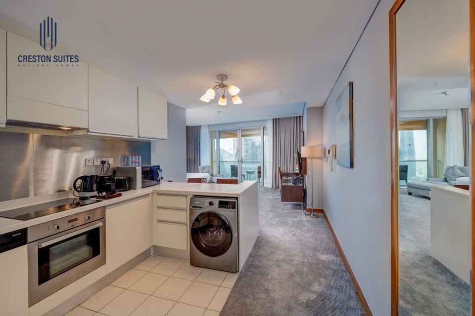 The kitchen and dining area layout and furnishings may vary slightly between rooms, yet each offers a stylish, comfortable, and well-appointed setting for your stay