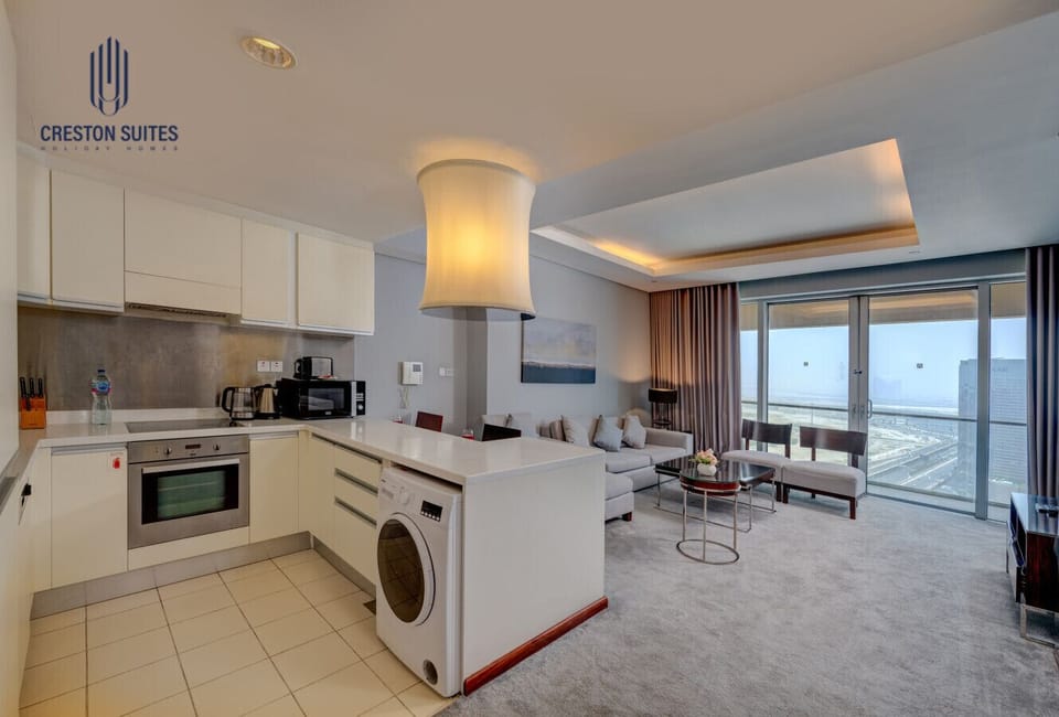 The kitchen and dining area layout and furnishings may vary slightly between rooms, yet each offers a stylish, comfortable, and well-appointed setting for your stay