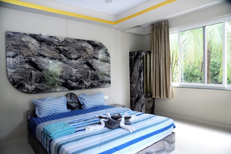 Deluxe Double Room, Balcony, Garden View | Free WiFi