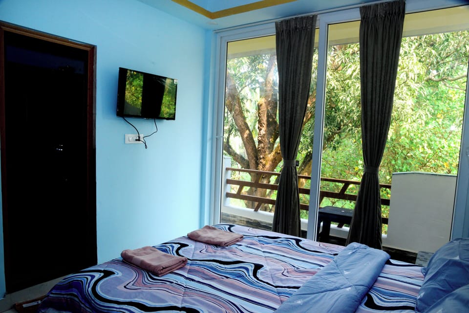Deluxe Double Room, Balcony, Garden View | Free WiFi
