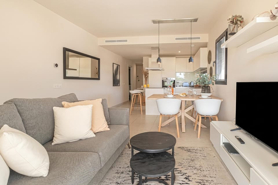 Family Apartment, Multiple Bedrooms, 2 Bathrooms (Luxury Jardinana Lotus 700m To Beach) | Living area | 21-inch flat-screen TV with cable channels