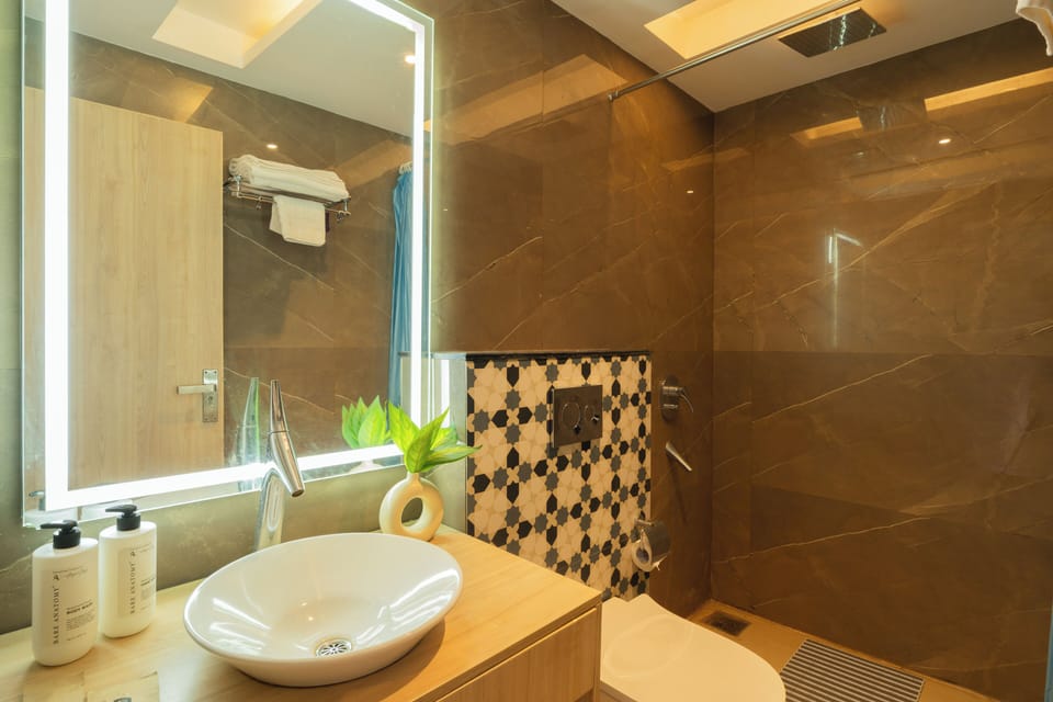 Standard Suite, Balcony, Beach View | Bathroom | Shower, towels, soap, shampoo