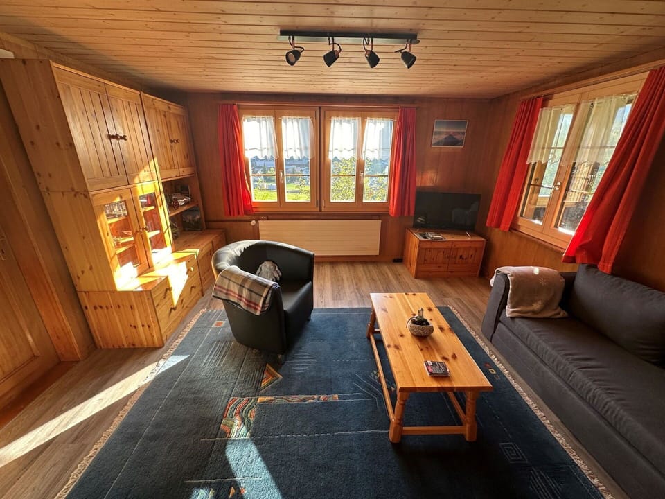 Furniture, Property, Couch, Window, Picture Frame, Wood, Interior Design, Table, Floor, Curtain