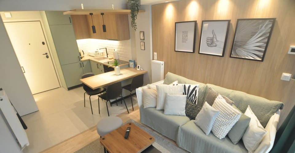 Premium Apartment, City View | Living area | Flat-screen TV