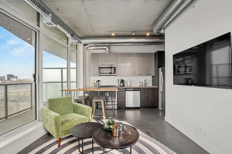Enjoy cooking, relaxing, and unwinding in this sunlit, modern open-plan suite.