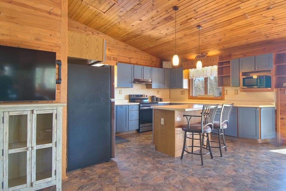 The kitchen is big and functional.