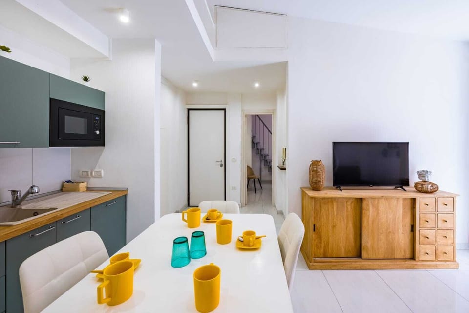 Comfort Apartment, City View | Living area | Flat-screen TV