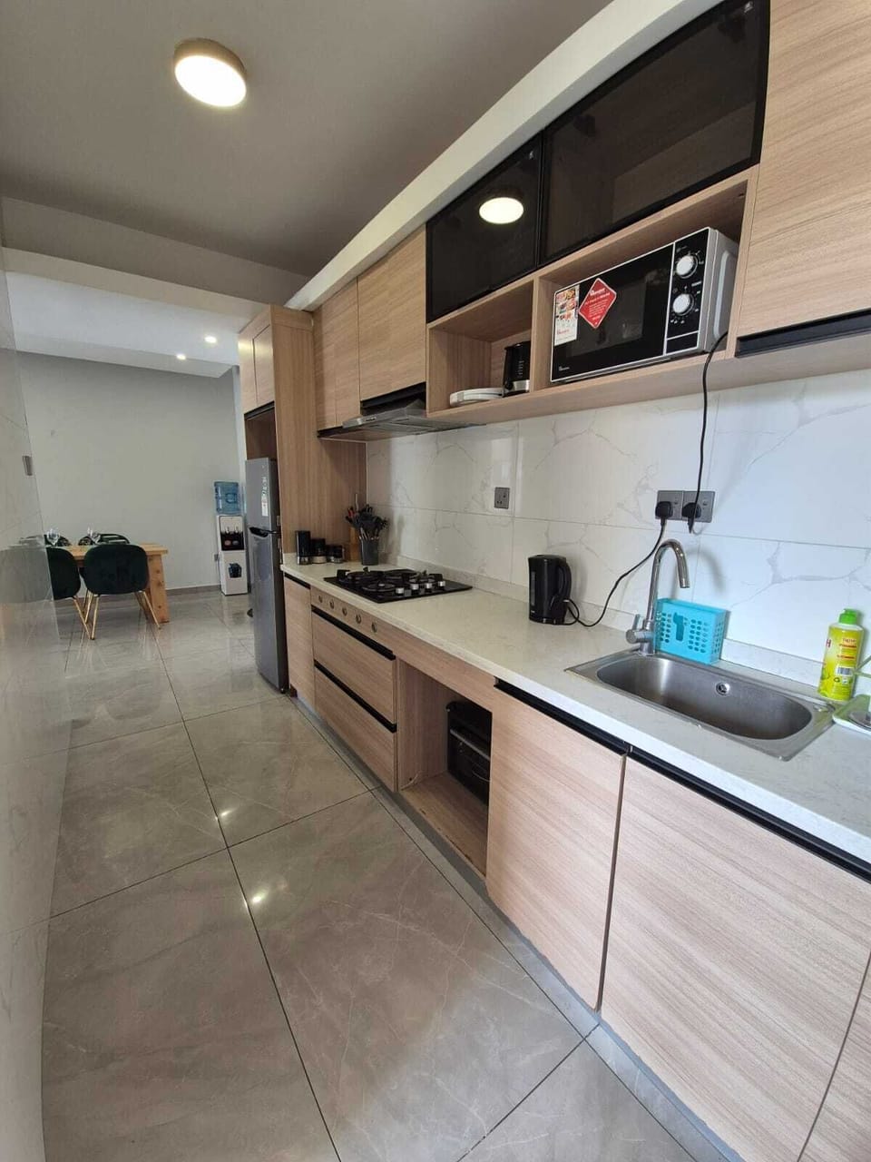 Executive Apartment, Balcony, City View | Private kitchen | Fridge, microwave, cookware/dishes/utensils