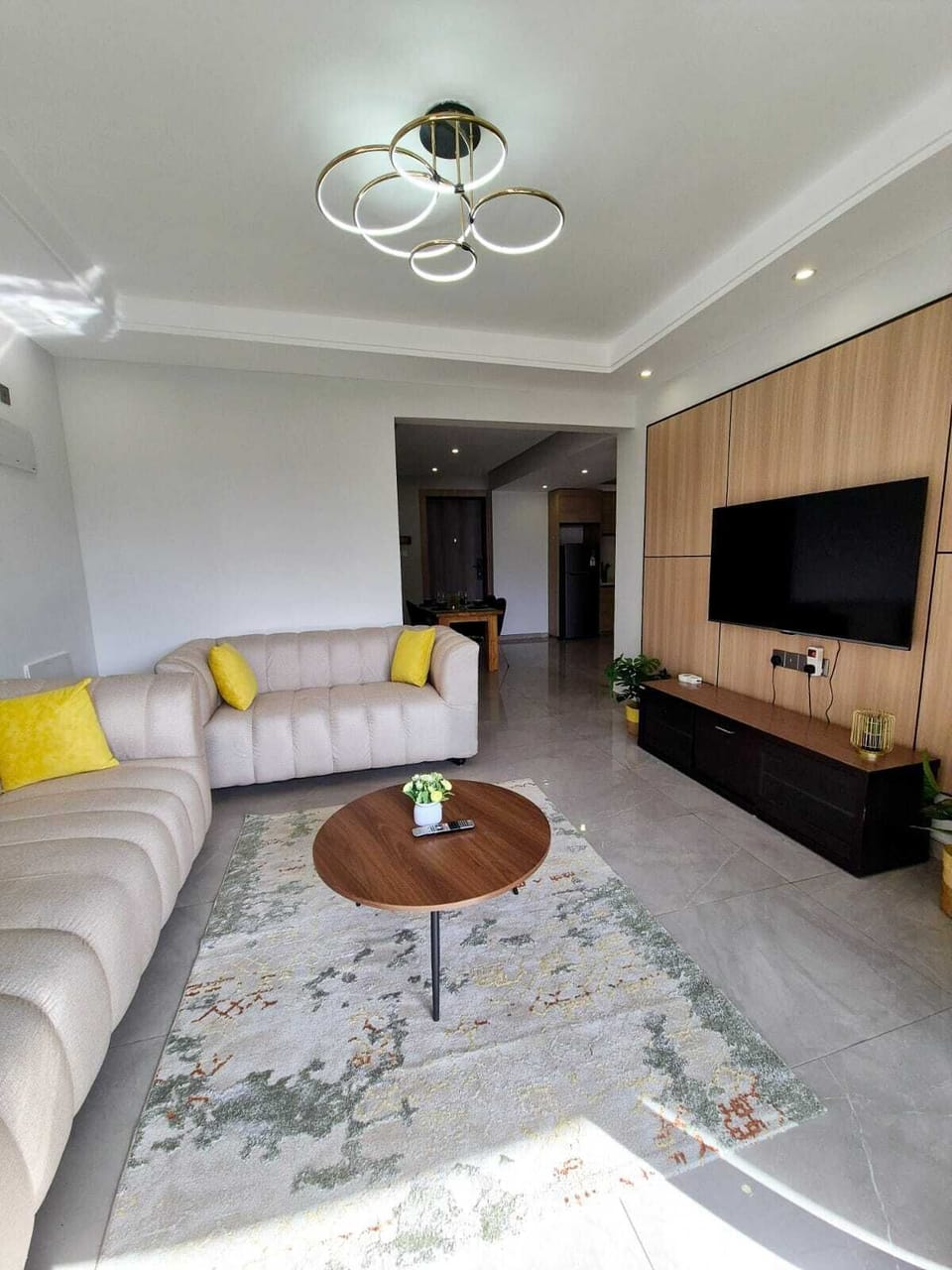 Executive Apartment, Balcony, City View | Living area | 32-inch Smart TV with digital channels