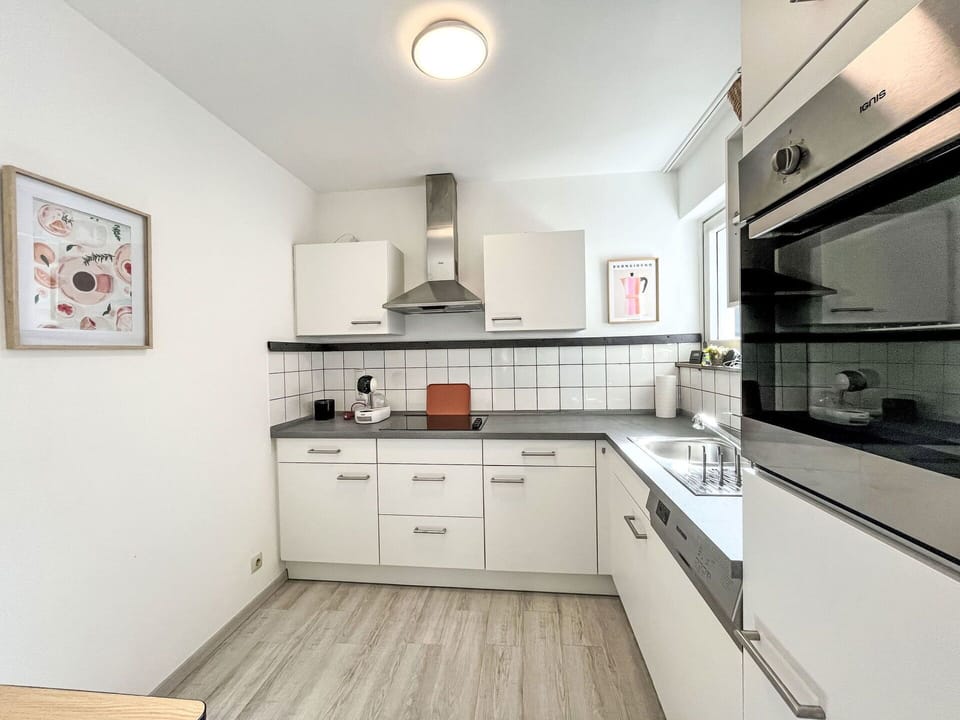 Kitchen, Countertop, Kitchen Appliance, Major Appliance, Interior Design, Cabinetry, Flooring, Floor, Sink, Room