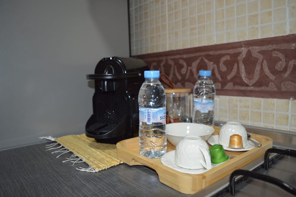 Apartment, Garden View, Poolside | Coffee and/or coffee maker