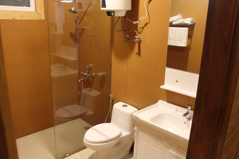 Shower, rainfall showerhead, eco-friendly toiletries, towels