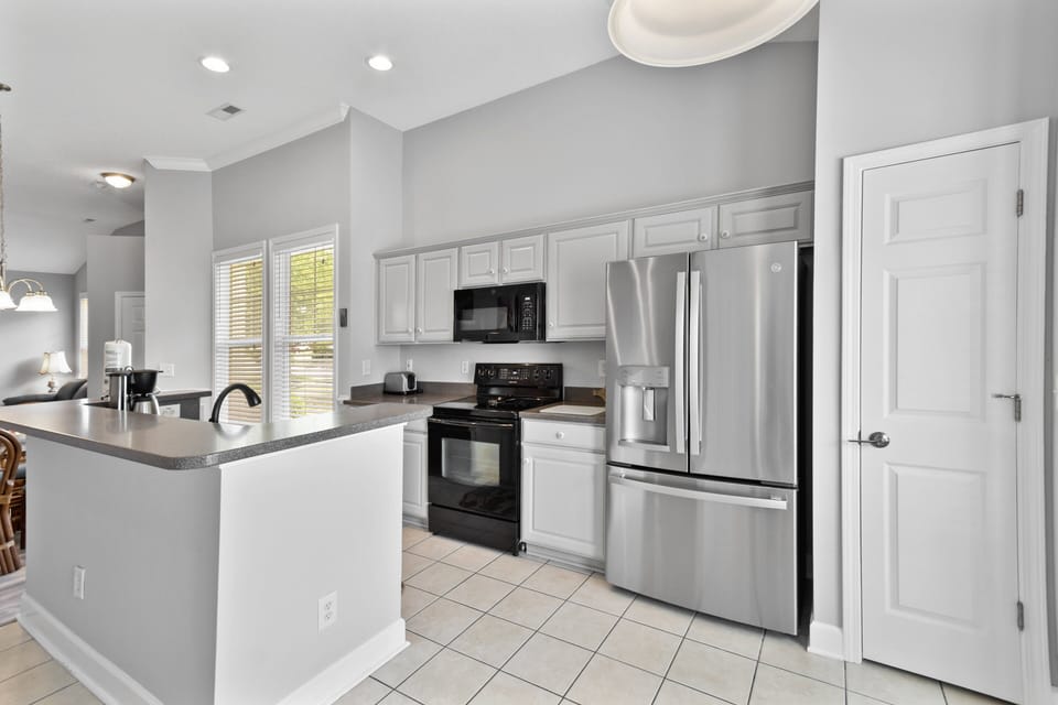 Townhome, 3 Bedrooms | Private kitchen | Coffee/tea maker, fridge, oven, toaster