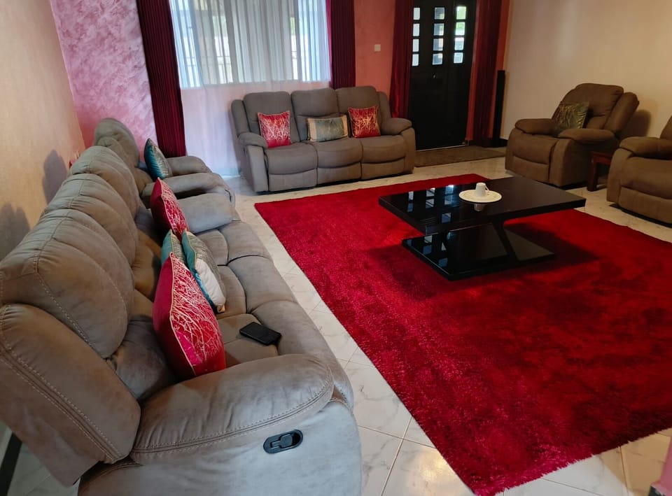 Deluxe Apartment, City View | Living area | 32-inch Smart TV with digital channels