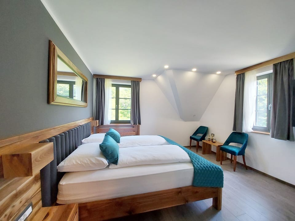 Deluxe Triple Room, Garden View | In-room safe, free WiFi