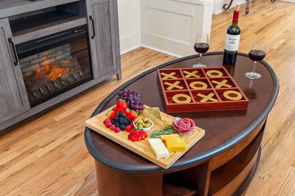 Thoughtful touches, such as stylish decor and warm lighting, enhance the room's relaxing vibe.