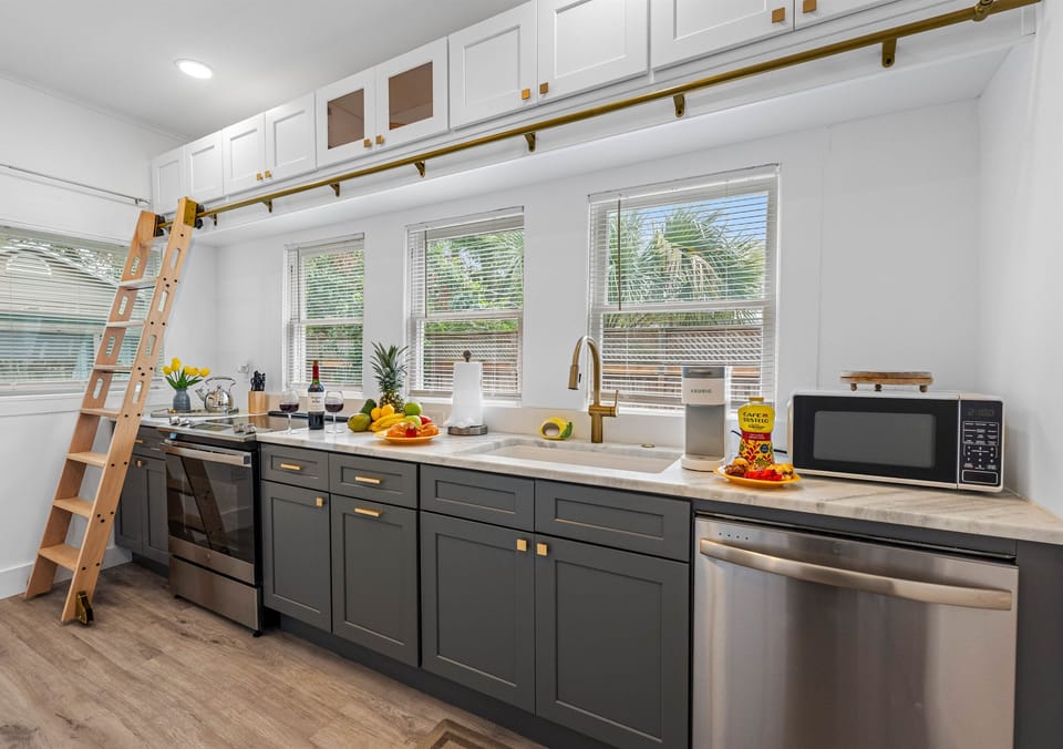 The kitchen is a true gem, designed with both style and functionality in mind. 