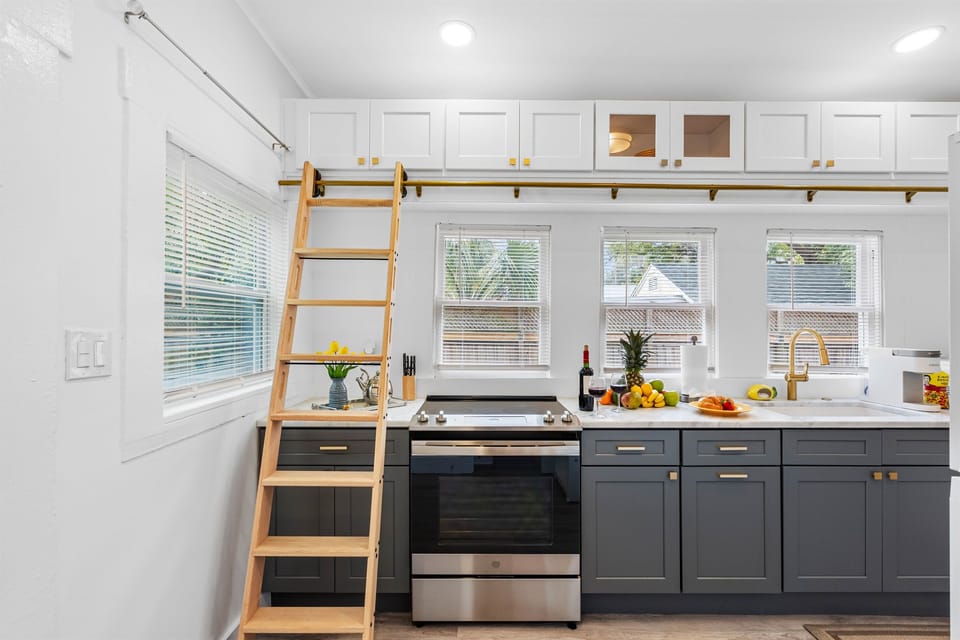 The clean, contemporary design ensures that the kitchen feels open and airy, making cooking a pleasure rather than a chore.