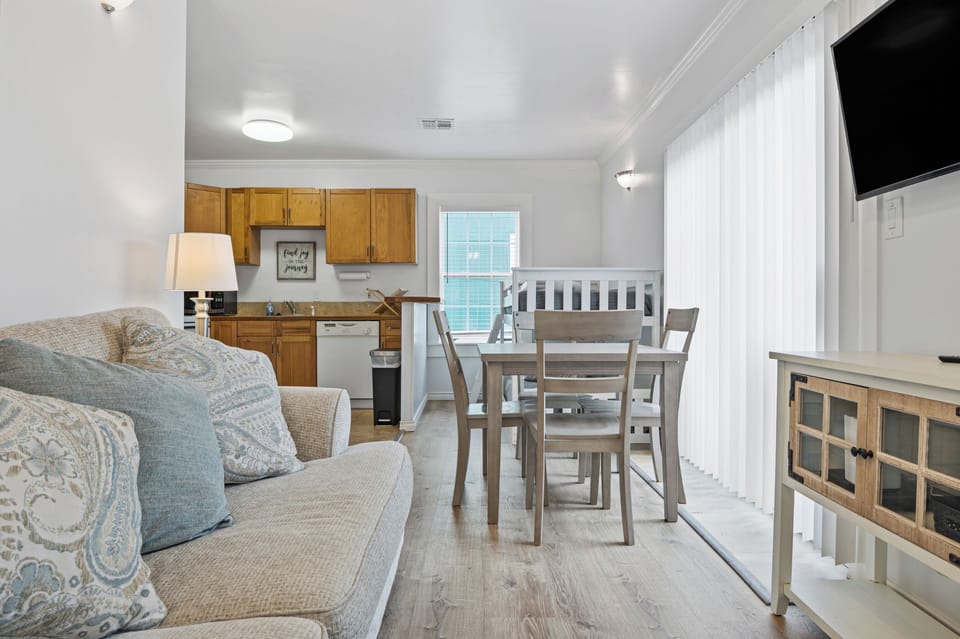 Head over to the dining area and kitchen