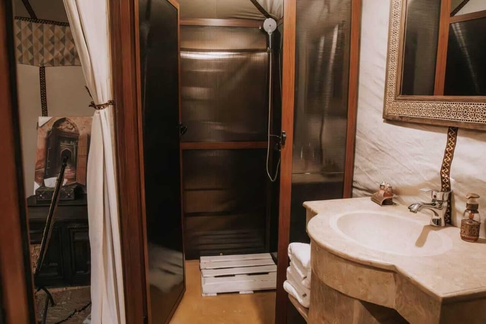 Shower, bidet, towels, soap