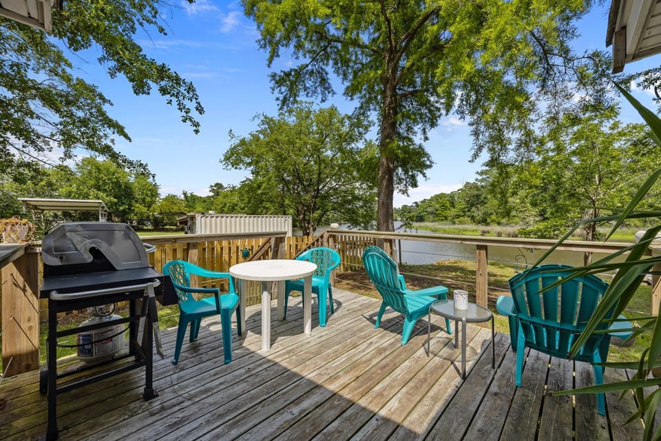 Deck overlooking Scott’s Creek with peaceful views and local wildlife spotting.