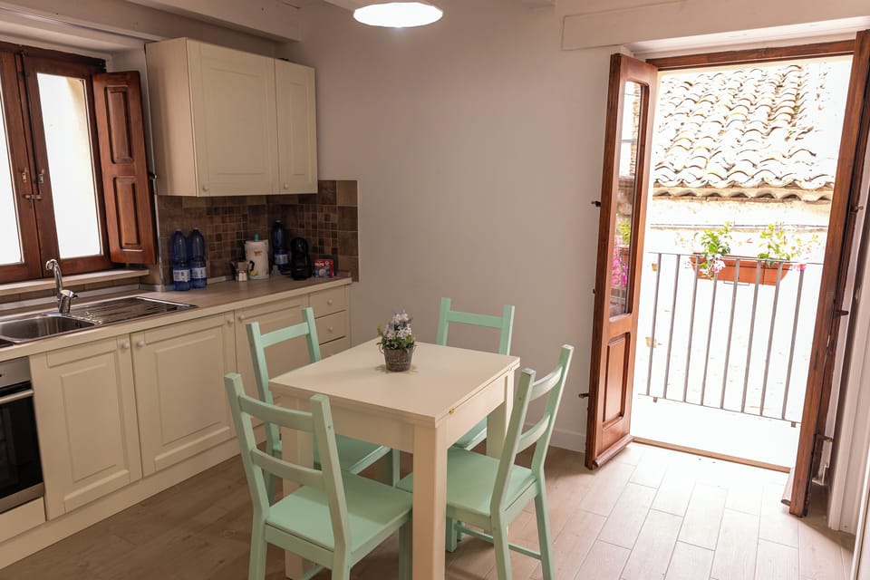 Family Apartment, Balcony | Private kitchen | Highchair