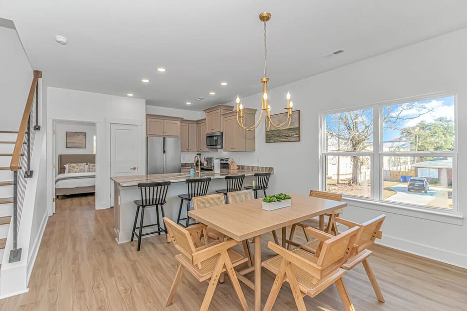 Spacious dining space with kitchen island seating and open layout