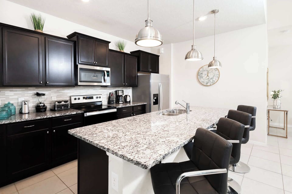 Sip morning coffee or grab a bite at the kitchen counter, with seating for 4
