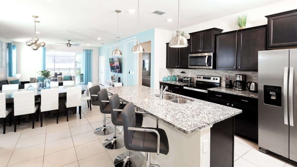 Sip morning coffee or grab a bite at the kitchen counter, with seating for 4